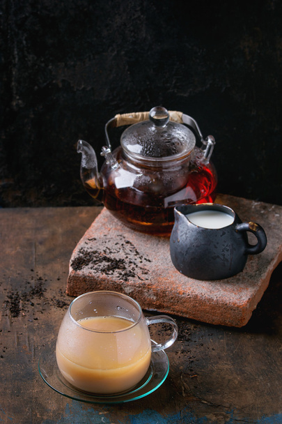 Cup of black tea with milk - Fotó, kép