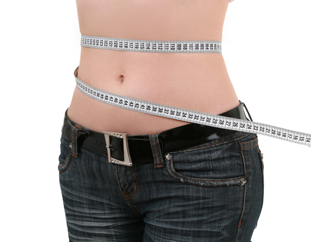 Measuring tape around a waist, woman. - Photo, Image