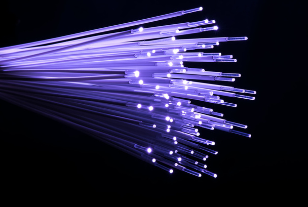 optical fibres dinamic flying from deep on technology background - Photo, Image