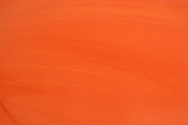 Oranje verf penseelstreken te wijzigen op het oppervlak - Foto, afbeelding