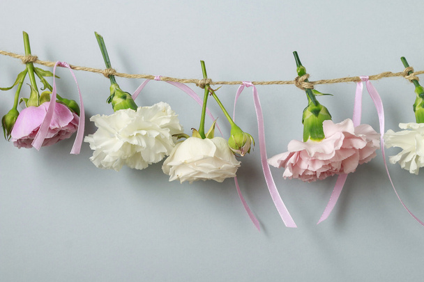 Flower garland for wedding or other celebrations. Carnations, ro - Photo, image
