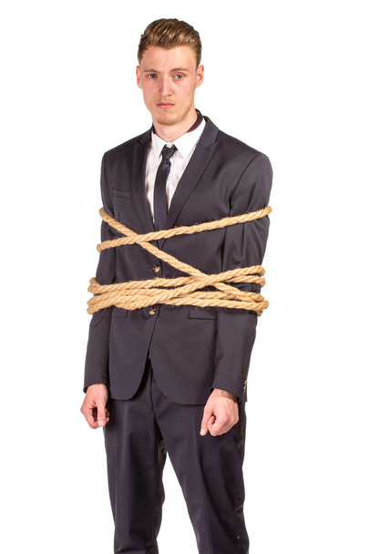 Businessman tied up in rope.  - Foto, immagini