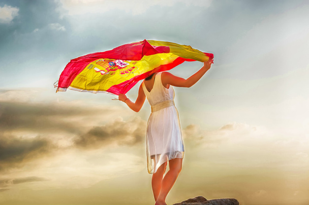 Jeune femme avec drapeau espagnol
  - Photo, image