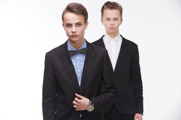 Two young businessmen at meeting - Fotoğraf, Görsel