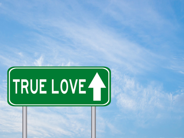 Зелений транспортний знак з справжнім коханням і напрямком на
 - Фото, зображення