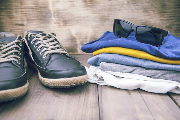 man sneakers and clothing - 写真・画像