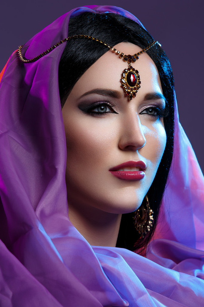 Beautiful girl with arabic makeup - Фото, изображение