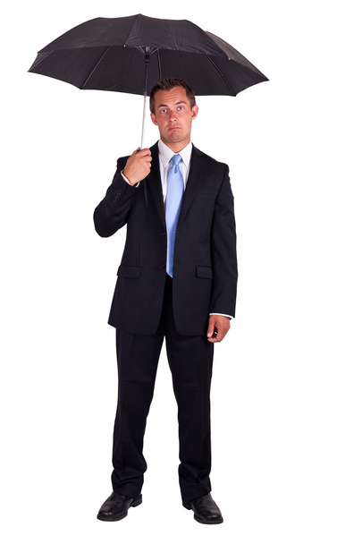 Business man with umbrella - Foto, Bild