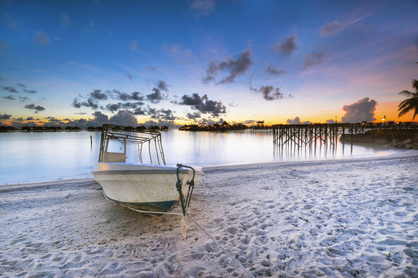 Spead boat with beautiful sunset background in island  - Photo, Image