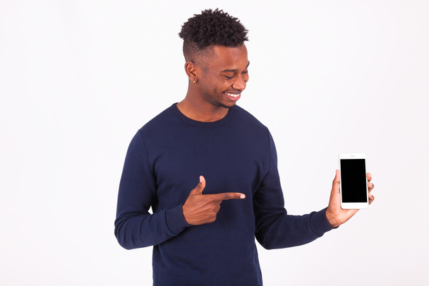 Young African American man pointing his  smartphone screen - Bla - Photo, image