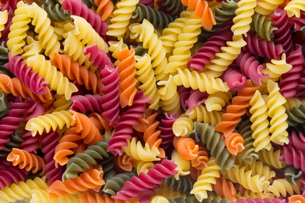 Closeup of raw eco macaroni pasta background.  - Foto, Bild