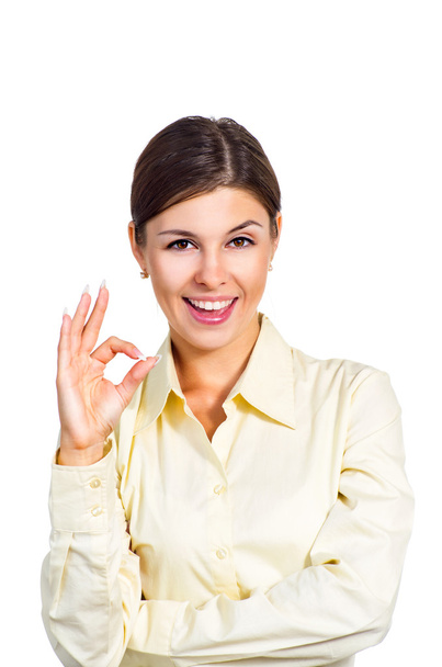Mujer de negocios muestra el signo ok
 - Foto, imagen
