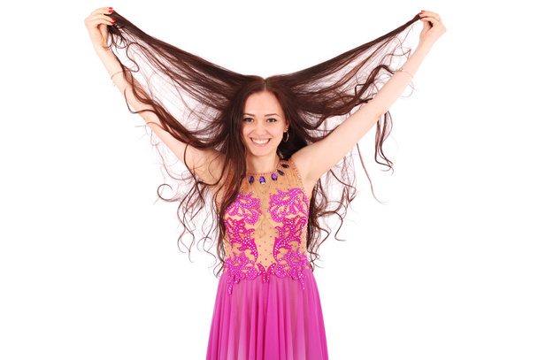 Girl playing hair in evening dress - Fotó, kép
