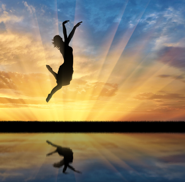 happy woman jumping at sunset - Zdjęcie, obraz