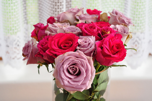 A bouquet of pink and purple roses - Foto, Imagen