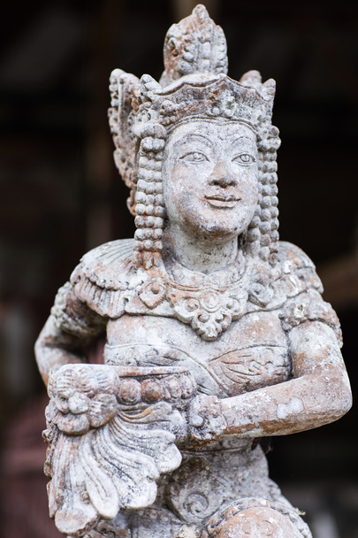 Каменная статуэтка в балийском храме
 - Фото, изображение