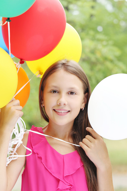 Portrait of  girl with balloons - Zdjęcie, obraz