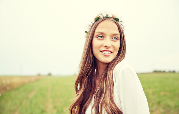 smiling young hippie woman on cereal field - Photo, Image