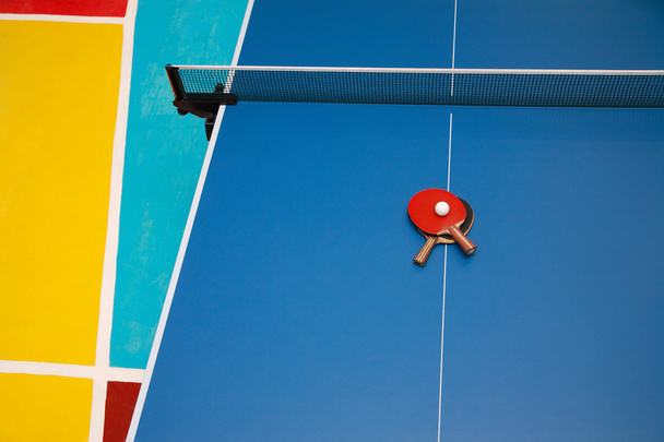 Rackets and ball on tennis table - Photo, Image
