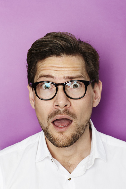 Shocked man in spectacles - Foto, imagen