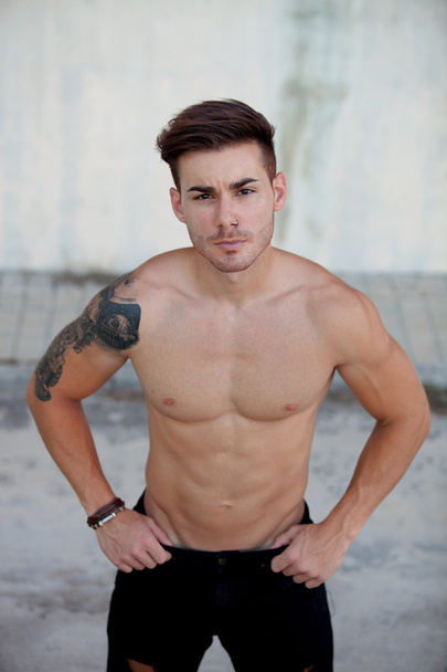 Handsome fit athletic shirtless man   - Valokuva, kuva
