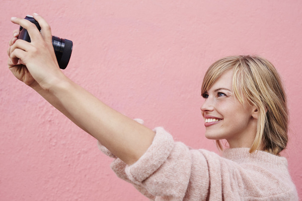 woman taking selfie with camera - Φωτογραφία, εικόνα