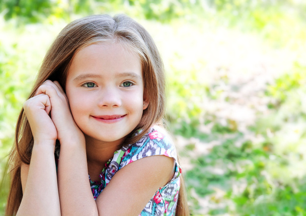 Portrait of adorable smiling little girl in summer day  - Foto, imagen
