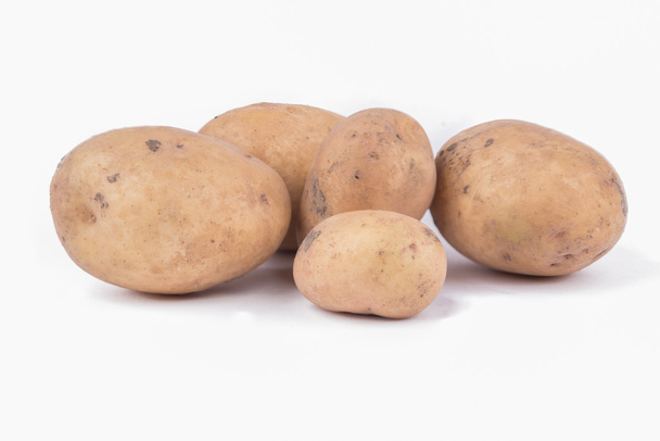 Patatas sobre blanco
 - Foto, imagen