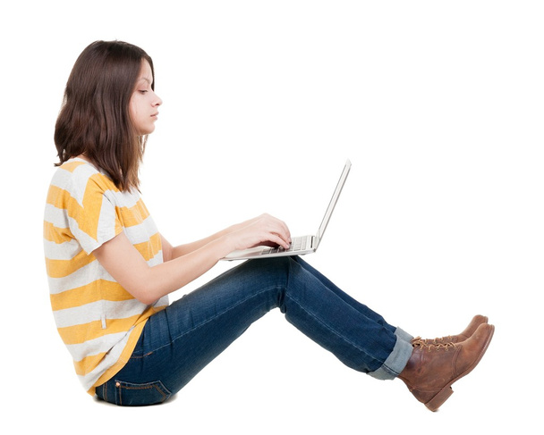 Woman sitting on floor with laptop. - Foto, Bild