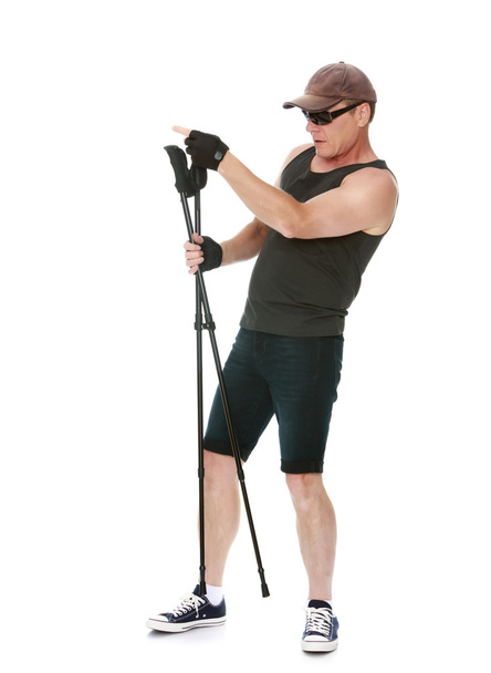 The man is engaged in Nordic walking - Foto, immagini