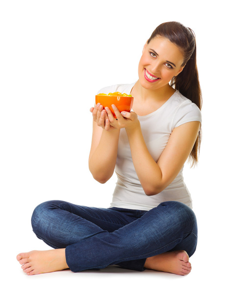 Young smiling girl with fruit salad - Photo, image