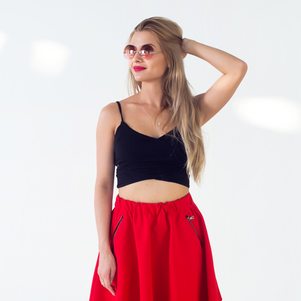 Young blond model presenting new fashionable summer look - Photo, Image