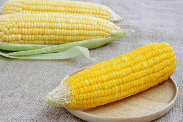 Fresh corn on wood plate - Photo, Image