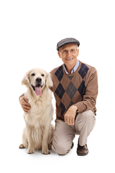 Elderly man posing with a dog - Фото, зображення