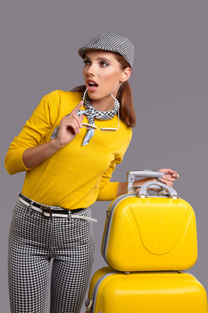woman with yellow suitcase - Φωτογραφία, εικόνα
