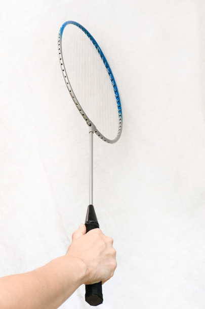 Badminton racket in hand - Photo, Image