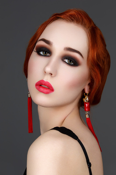 Beautiful girl with smoky eyes and red lips - Zdjęcie, obraz