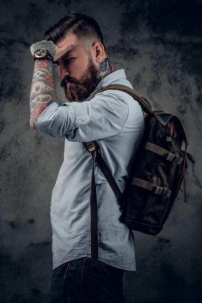 Tattooed backpacker posing  - Photo, image
