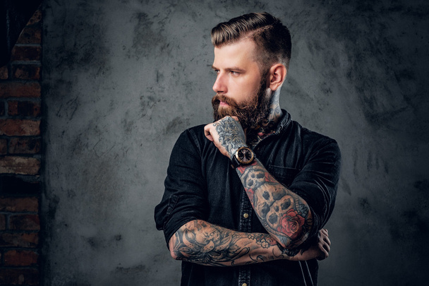 Bearded hipster with tattooes on his arms - Photo, Image