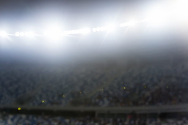 Foule floue de spectateurs sur une tribune de stade lors d'un événement sportif
 - Photo, image