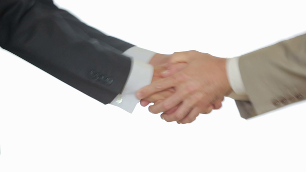Un apretón de manos de negocios con fondo blanco, dos hombres se dan la mano
 - Metraje, vídeo