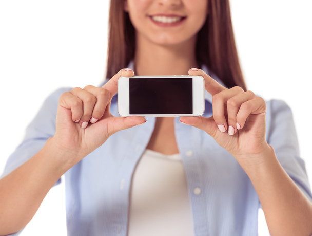 Attractive young girl with gadget - Foto, immagini