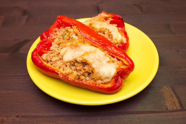 Peppers stuffed with cheese on wood - Photo, Image