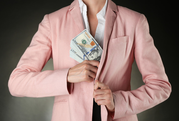 young Woman with money  - 写真・画像