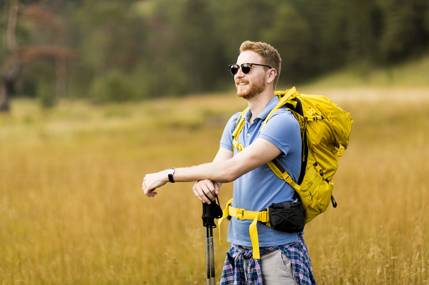 Young man hiking - Photo, Image