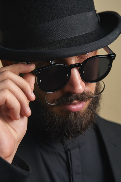 Portrait of bearded Man with Bowler Hat - 写真・画像