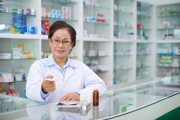 pharmacist giving best medication - Photo, Image