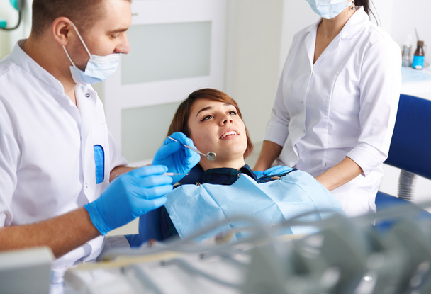 Dentist with patient in clinic  - Fotoğraf, Görsel
