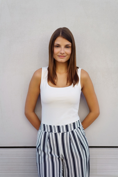 Gorgeous woman in striped white and black outfit - Valokuva, kuva