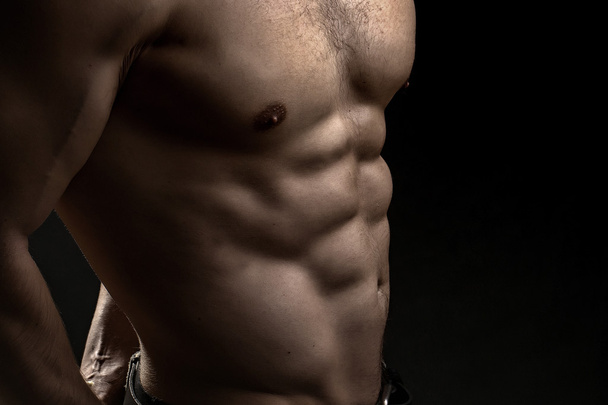 Torso masculino muscular
 - Foto, Imagem